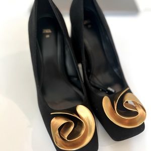 Suede heels with gold buckle